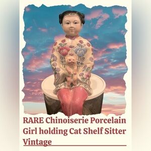 Vintage Chinese Porcelain Shelf Sitter
Figurine Holding A Cat.